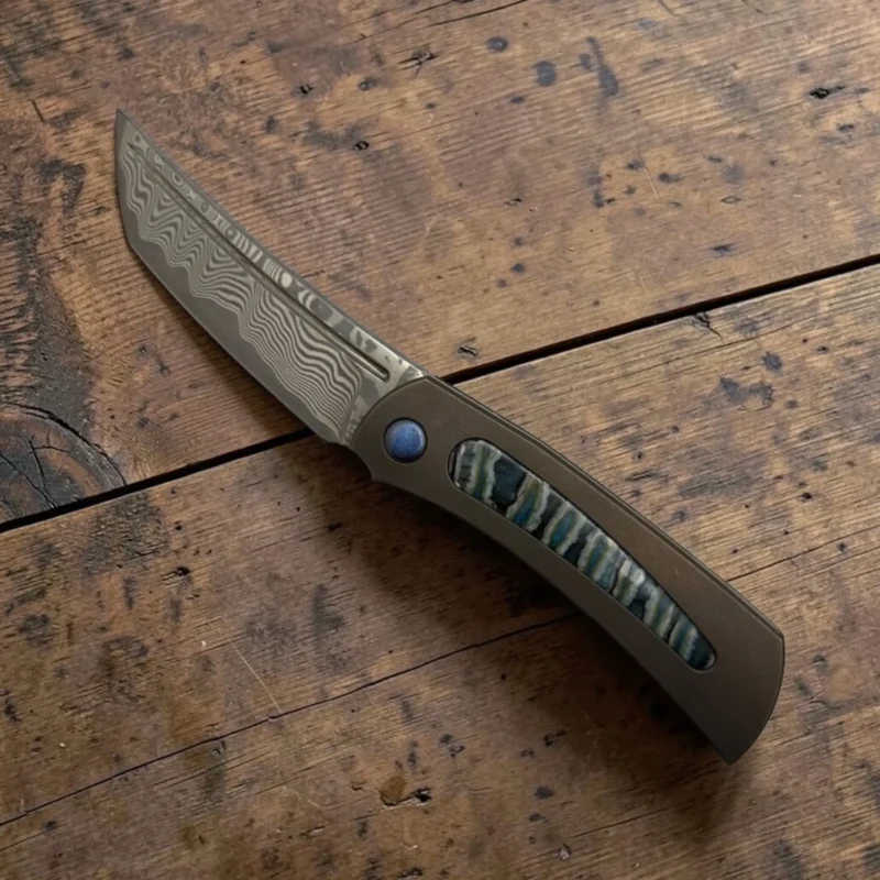 Seraphim-Knives-img1 Seraphim Knives Yakuza Custom Folding Knife – Laminated Blade, Titanium & Mammoth Tusk Inlay